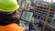 © Old Man Stocker - Construction Worker Reviewing Building Plans on Tablet. Construction worker in a hard hat and safety vest inspects digital building plans on a tablet at an active construction site.