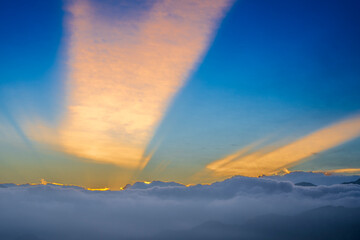 Sun rays on the sky ,sunrise time, sea of clouds