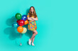 © deagreez - Full size photo of pretty teen girl crossed hands air balloons wear trendy colorful outfit isolated on aquamarine color background