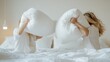© JoxyAimages - Two individuals are joyfully engaged in a pillow fight on a white bed wearing comfortable clothing. The scene is bright and filled with playful energy and movement.
