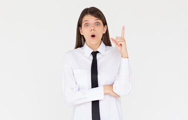 Image of excited young lady standing isolated on white background. Looking at camera have an idea.