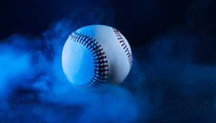 Baseball ball in blue smoke on dark backdrop. Sport game concept. Close-up.