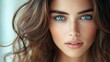 © Raitalinn - A beautiful woman with blue eyes and long brown hair, her gaze serene and inviting.