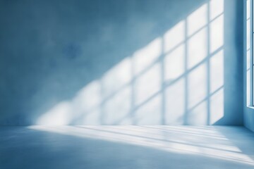 Wall Mural - blurred diffused light casting intricate patterns of shadow across a blue tinted grunge textured int