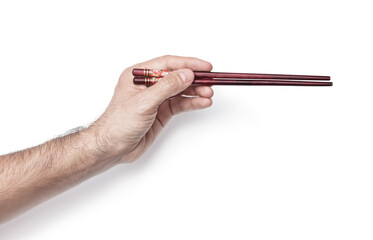 man's hand with chinese sticks isolated white background.