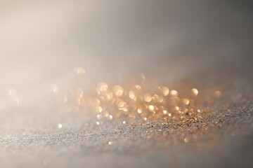 Poster - Beautiful shiny glitter on grey background, closeup