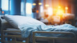 © alexkich - Empty Hospital Bed in Sunlit Room at Dusk Representing Healthcare and Recovery
