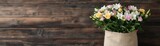 Sack filled with fragrant birthday flowers like freesia and lilies, offering a beautiful and aromatic gift, birthday flowers sack, fragrant floral gift