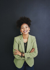 Wall Mural - Portrait, arms crossed and happy business woman in studio for pride or job experience. Face, confidence and African professional, expert or creative journalist laughing isolated on black background