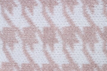 Canvas Print - Texture of knitted fabric with pattern as background, top view