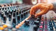 © Oleg - Sound engineer fine tuning audio levels at music festival with dj mixer for optimal performance