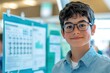 © Premreuthai - Cheerful student presenting project at science fair with glasses, showcasing research findings and engaging with the audience.