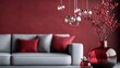 © JoxyAimages - A sophisticated living room featuring a grey couch with red cushions, red vases and berry decor, and elegant pendant lights, creating a stylish contrast and modern ambiance.