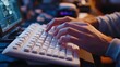 © Neuropixel - Tech accessibility. A close-up of a person's hands typing on a modern computer keyboard in a dimly lit workspace, emphasizing productivity and technology.