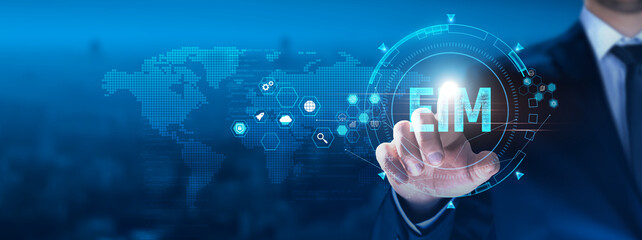 Wall Mural - eim concept: businessman touching eim on virtual interface, collaboration, efficiency, analytics, wo