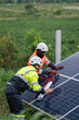 © NewSaetiew - Service engineer inspects and maintains solar panels in a cultivation area, promoting clean energy.