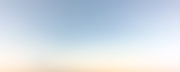 A light blue gradient background with a blurred sky at the top, featuring a white and beige color scheme.