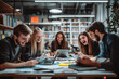 © ROJER - A group of young professionals in an office setting, gathered around digital devices and papers on the table. They're laughing together as they work through their projects with passion and joy.
