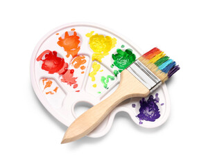 Brush and palette with colorful paints on white background