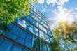© SKIMP Art - A modern office building with glass windows and trees in front, under the bright sunlight against a blue sky Generative AI