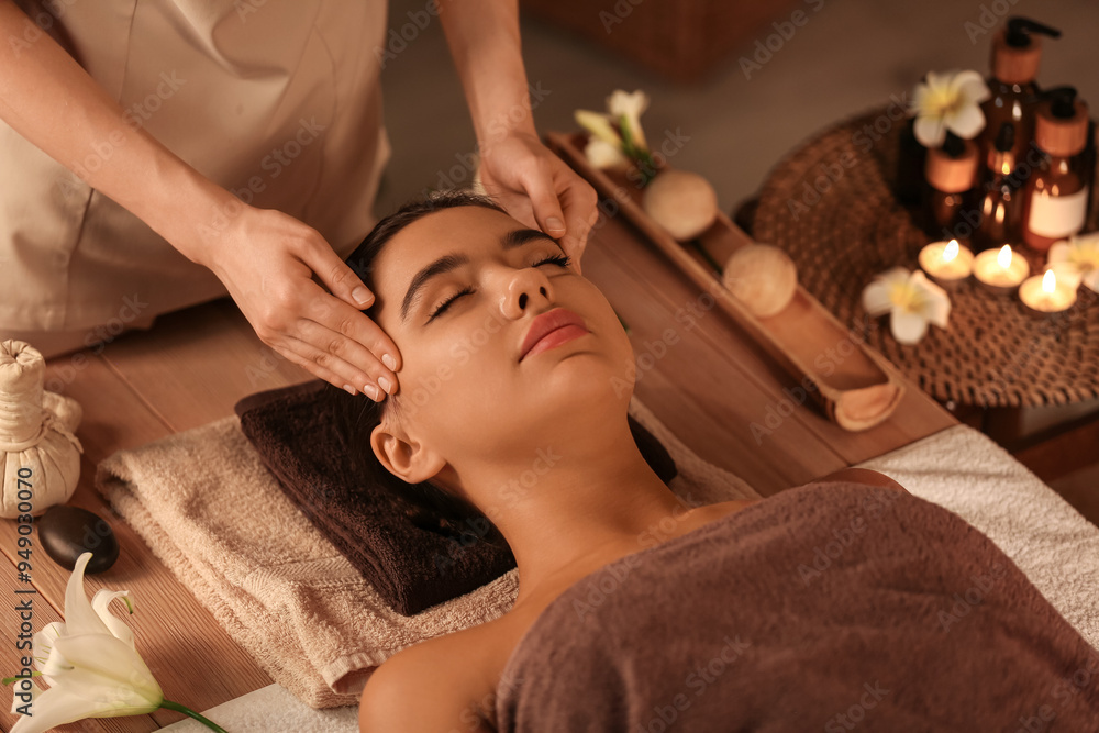 Beautiful woman receiving spa massage in salon