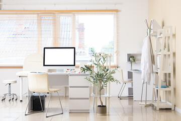 Canvas Print - Light interior of doctor's office with modern workplace