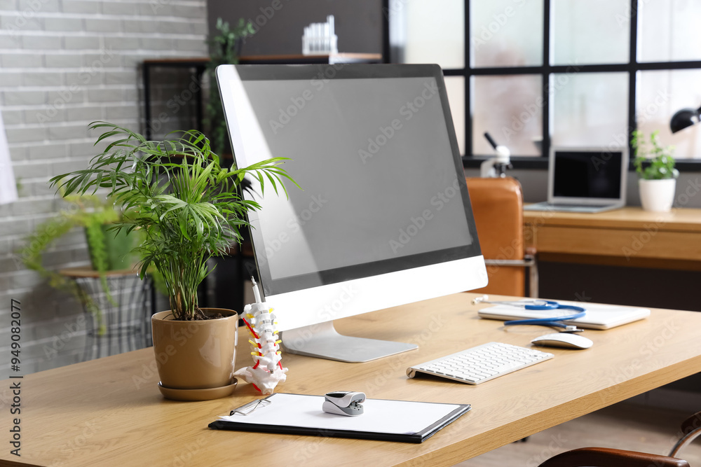Modern workplace of doctor with computer in clinic