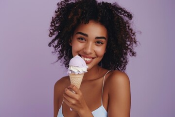 Canvas Print - A young woman enjoying her favorite treat on a warm day