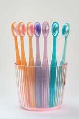 Wall Mural - A collection of toothbrushes placed in a cup, ready for use