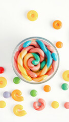 Wall Mural - Colorful candies in a glass bowl