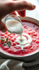 Wall Mural - Pouring Cream into Beetroot Soup