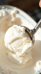 Wall Mural - Closeup of a Scoop of Vanilla Ice Cream