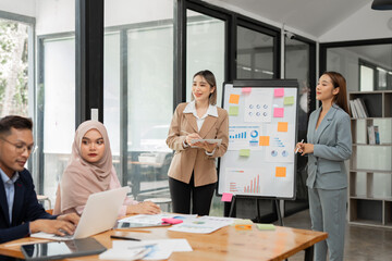 Wall Mural - Asia business meeting   consultations of business people in the company's meeting room. 