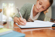 © KayExam/peopleimages.com - Learning, hand or child writing math equation to study, knowledge or test preparation in home school. Homework, girl or kid with pen for numbers, education or problem solving on notebook for solution