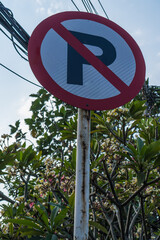 close-up view of a traffic sign with a prohibition to park sign.