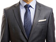 © SNK - Close-up of a fine textured gray suit jacket with a neatly folded white pocket square. Elegant and tailored look