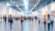 © Palung - Background of an expo or convention with blurred individuals in an exposition hall. Concept image for a international exhibition, conference center, corporate marketing, or event fair