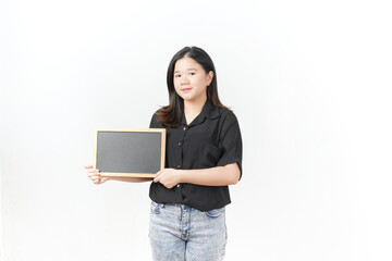 Wall Mural - Young Asian woman Showing and holding black or chalk board wearing Black t-shirt and jeans isolated on white background