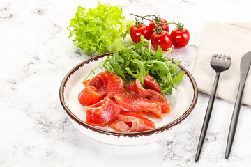 Canvas Print - Sliced salmon with fresh arugula