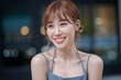 © Lull - Happy woman smiling. Smiling female with brown hair, wearing a sleeveless dress.