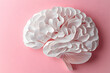 © Oksana - Paper cutout in the shape of a human brain isolated on background medical concepts
