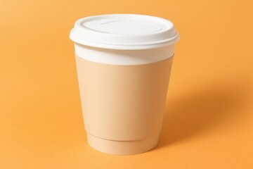 Wall Mural - Coffee Paper cup over a color background mockup