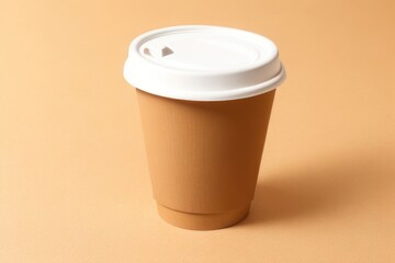 Wall Mural - Coffee Paper cup over a color background mockup