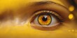 © Den Boro Day - A close-up shot of an individual's eye with a bright yellow background.