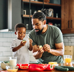 Wall Mural - child family kitchen food boy son father meal fun preparing healthy diet eating home black african american man happy ingredient having fun game joy bonding kid cute