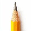 © Jira - Yellow Pencil Point Macro: A close-up shot of a sharpened yellow pencil point, showcasing the graphite tip in intricate detail