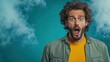 © I Have Photos - Man with shocked expression and open mouth, standing against a blue background with smoke.
