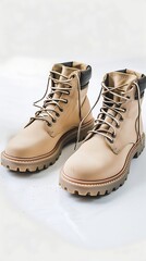 Wall Mural - pair of beige boots isolated on a white background