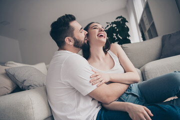 Poster - Photo of adorable sweet couple wear casual shirts kissing having fun enjoying weekend together indoors room home house