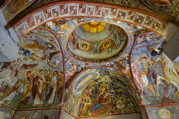 Frescoes on a wall of cave church in Goreme, Cappadocia, Turkey.